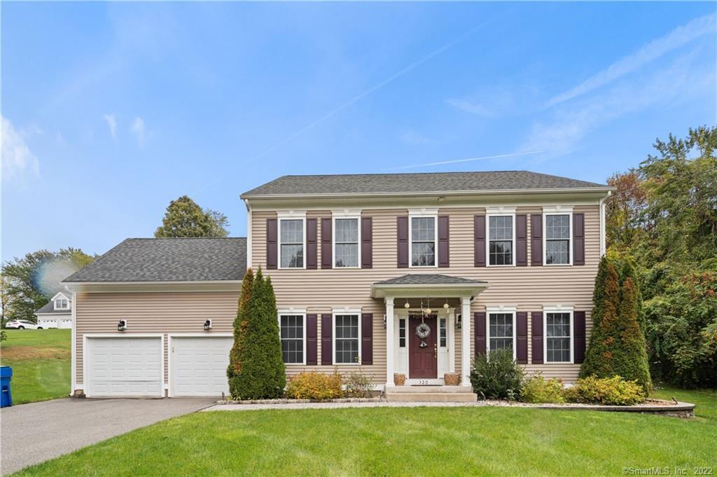 320 Abbe Road South Windsor, CT 06074 - Photo 1 of 1 a front view of a house with a yard