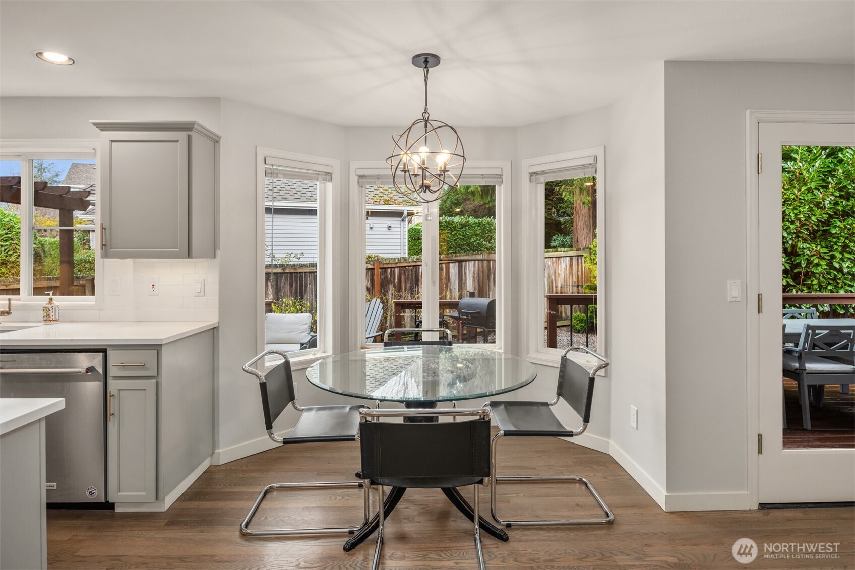 10330 Northeast 151st Place Bothell, WA 98011 - Photo 17 of 38 a view of a dining room with furniture window and outside view
