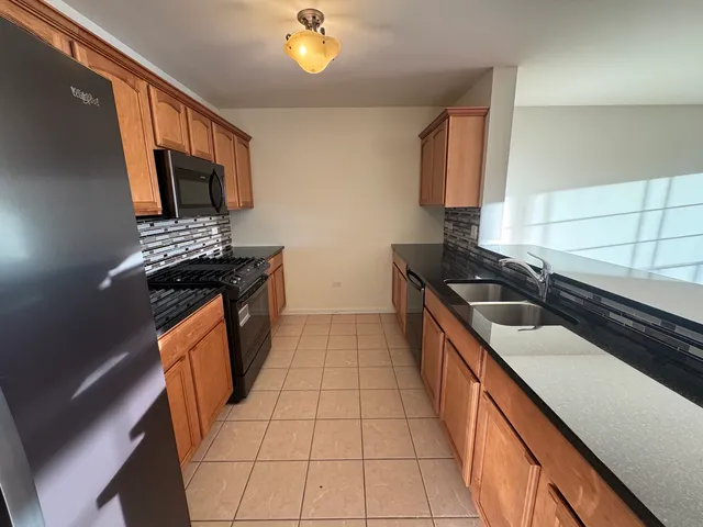 a bathroom with a shower and a sink