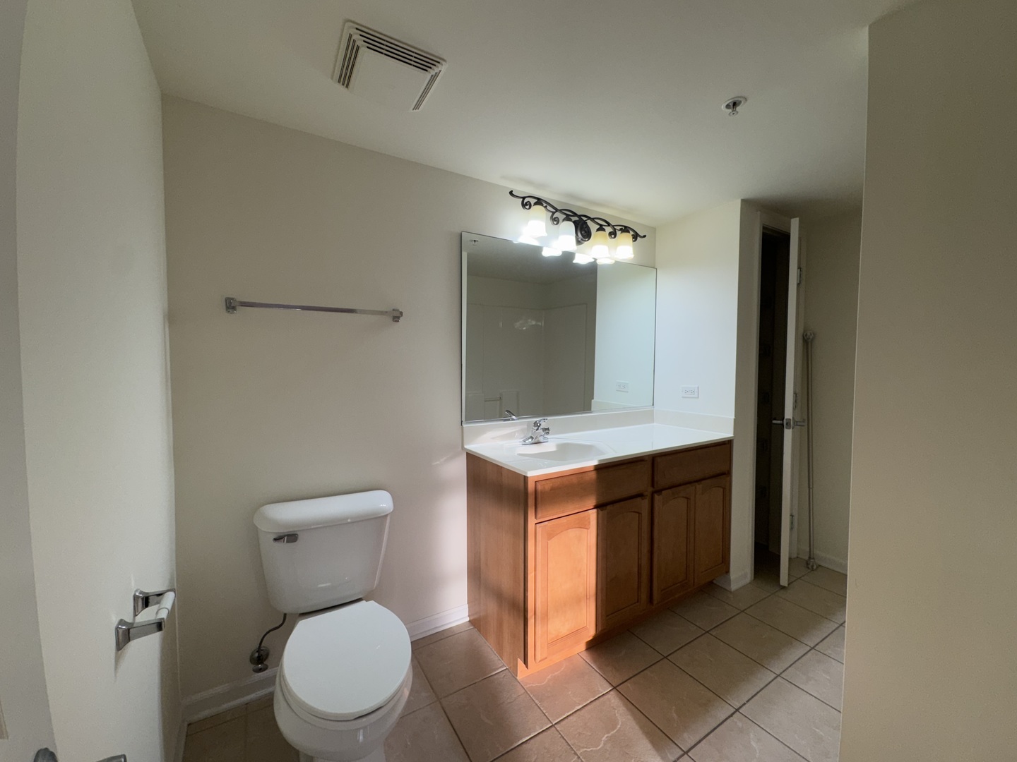 30 Nugent Street, Unit 430 Glenwood, IL 60425 - Photo 7 of 18 a bathroom with a sink and a toilet