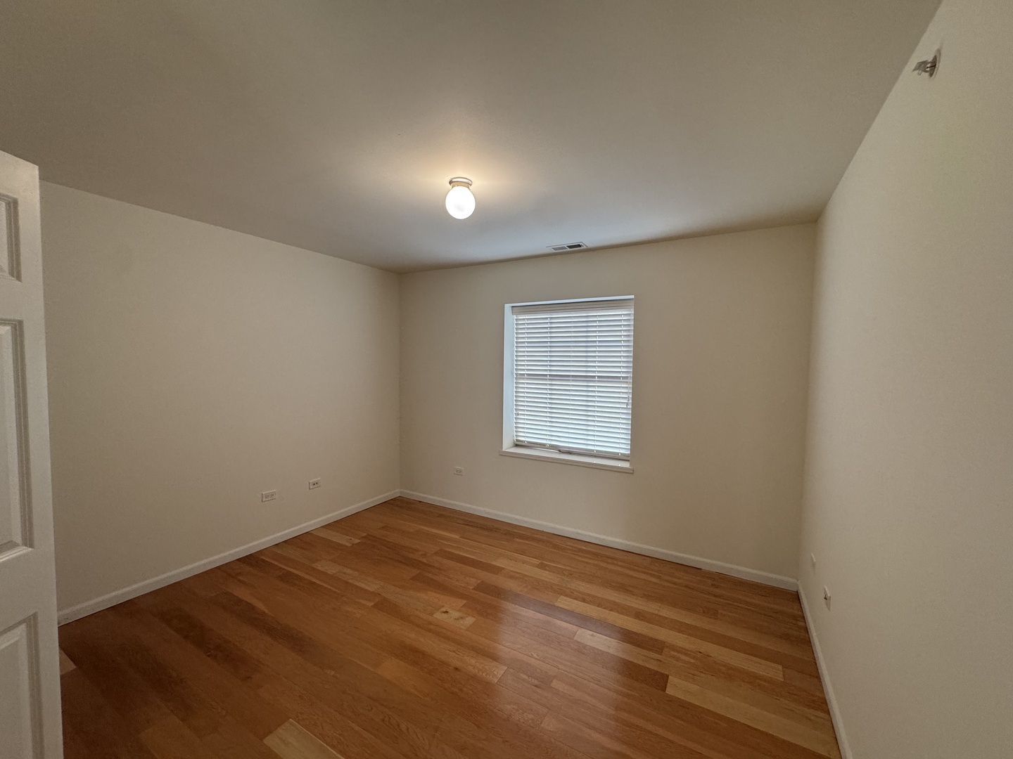 30 Nugent Street, Unit 430 Glenwood, IL 60425 - Photo 9 of 18 a view of an empty room with a window