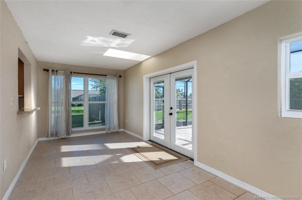 2891 Southeast Farley Road Port St. Lucie, FL 34952 - Photo 17 of 53 a view of an entryway with wooden floor