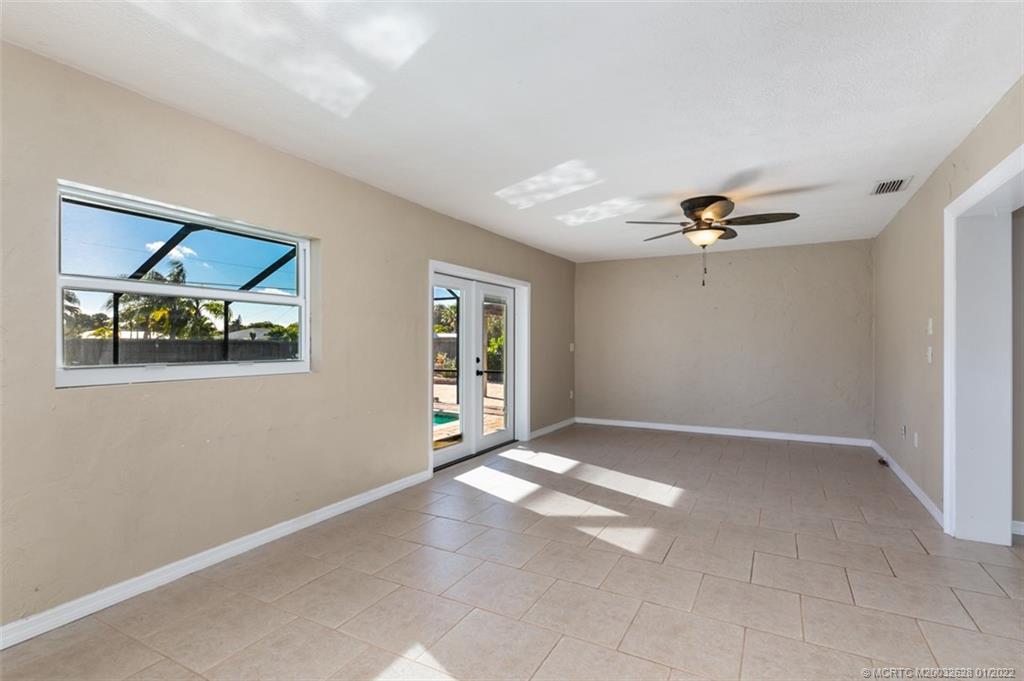 2891 Southeast Farley Road Port St. Lucie, FL 34952 - Photo 19 of 53 a view of an empty room with a window