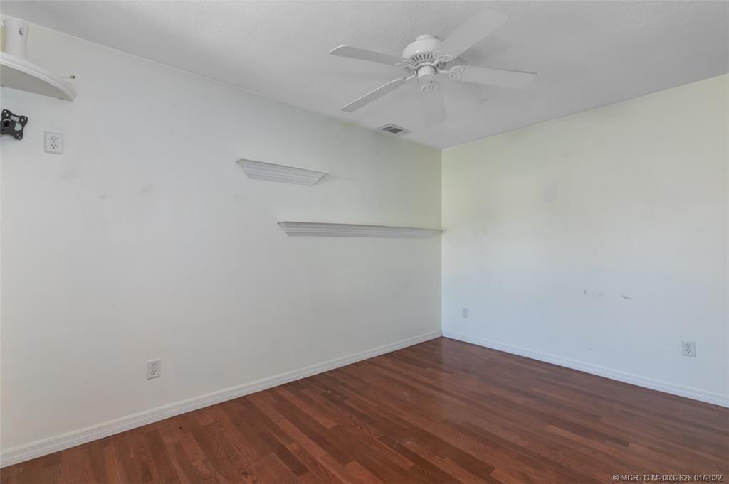 2891 Southeast Farley Road Port St. Lucie, FL 34952 - Photo 23 of 53 wooden floor in an empty room