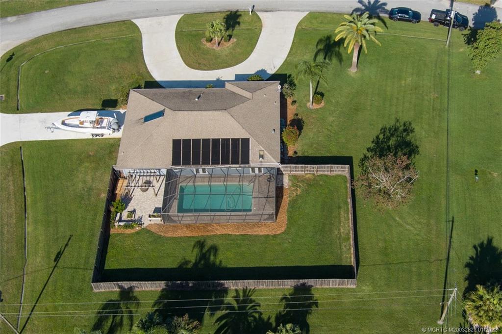 2891 Southeast Farley Road Port St. Lucie, FL 34952 - Photo 3 of 53 an aerial view of a residential houses with outdoor space and swimming pool