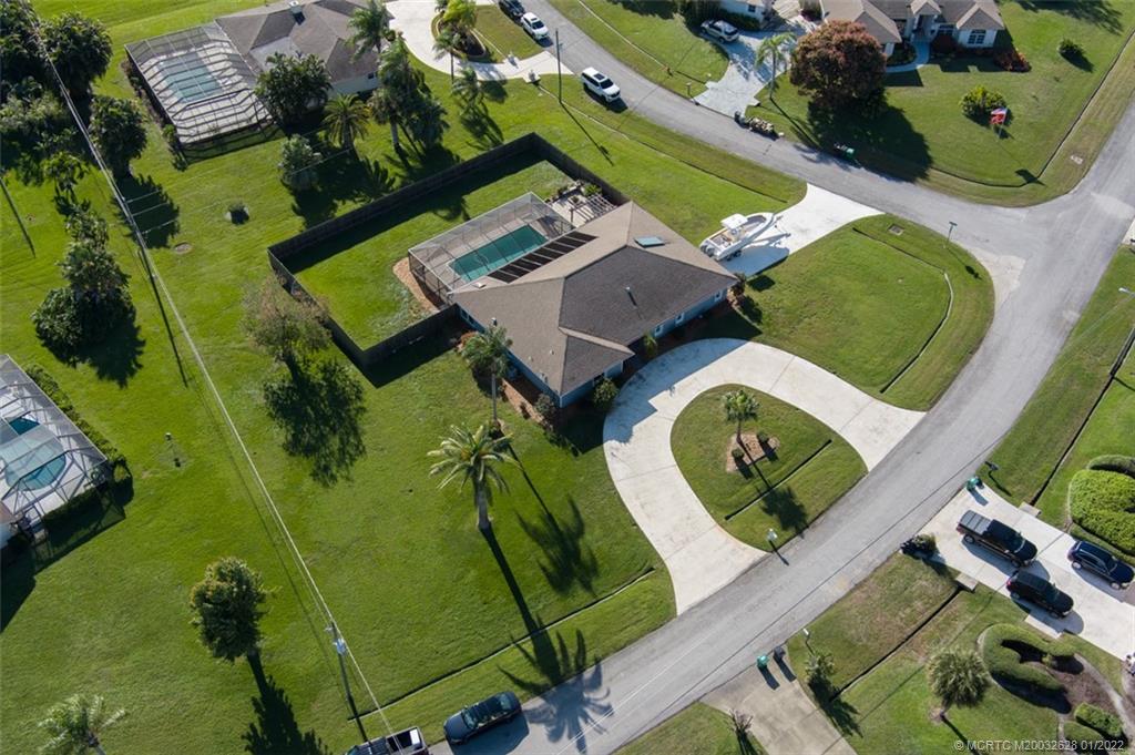 2891 Southeast Farley Road Port St. Lucie, FL 34952 - Photo 47 of 53 an aerial view of a swimming pool