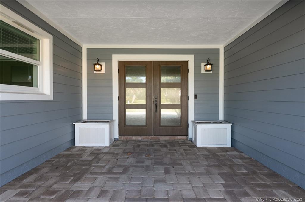 2891 Southeast Farley Road Port St. Lucie, FL 34952 - Photo 5 of 53 a view of an entryway of house