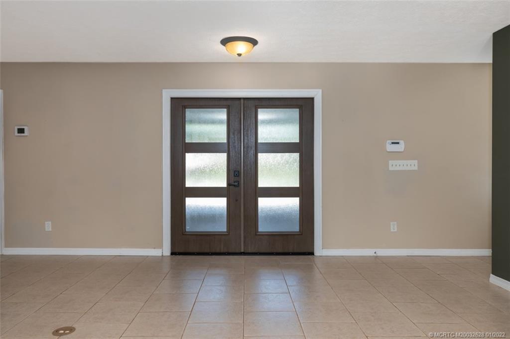 2891 Southeast Farley Road Port St. Lucie, FL 34952 - Photo 7 of 53 an empty room with window