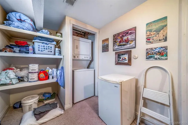 a storage room with washer and dryer