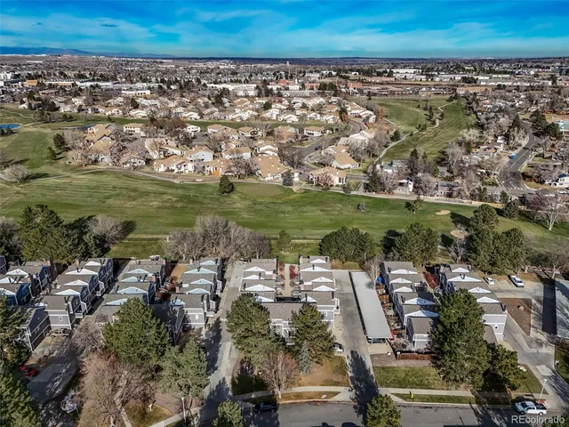 an aerial view of a city with lots of residential buildings