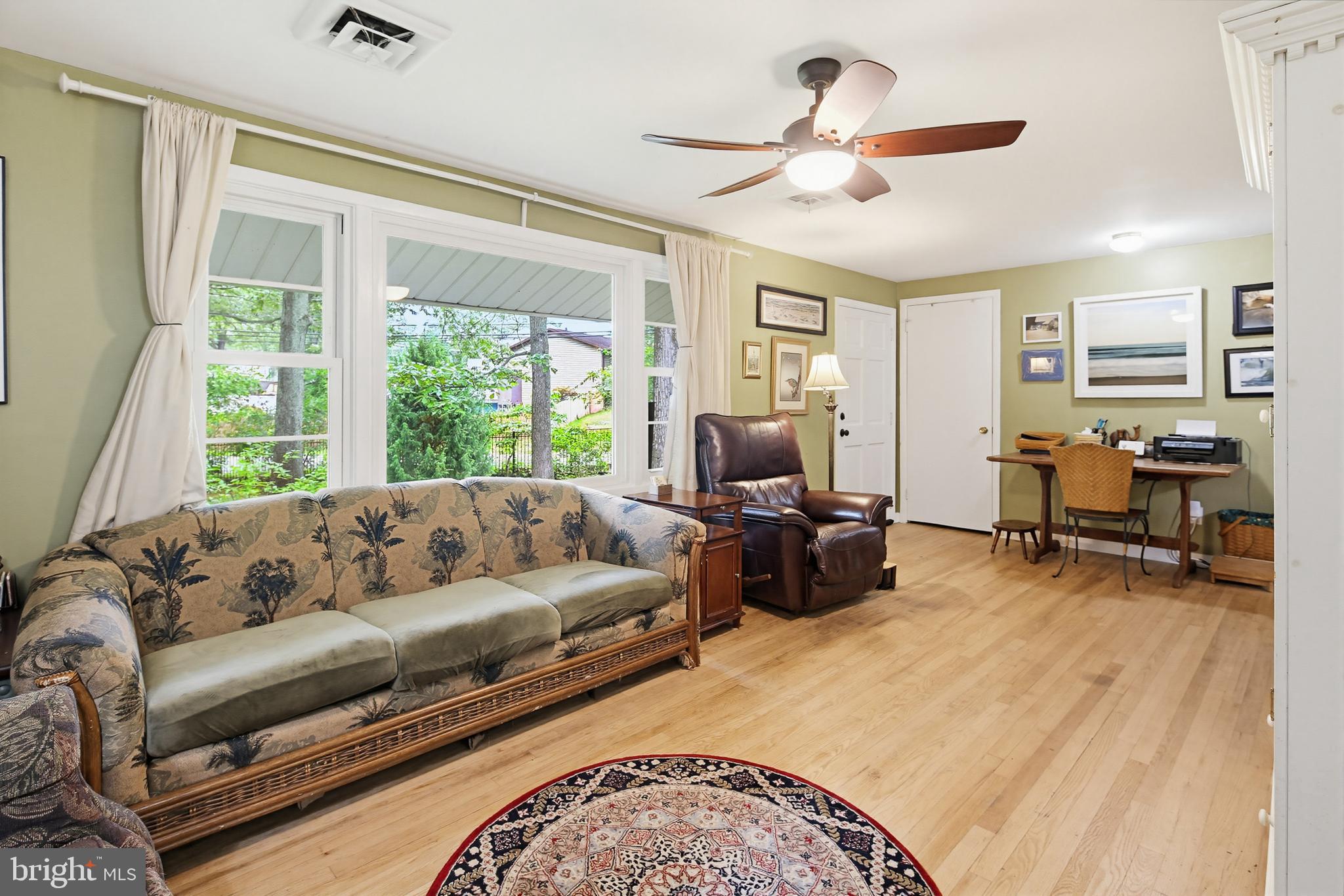 919 Blue Ridge Drive Annapolis, MD 21409 - Photo 23 of 30 a living room with furniture flat screen tv and a large window