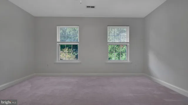 a view of a livingroom with wooden floor