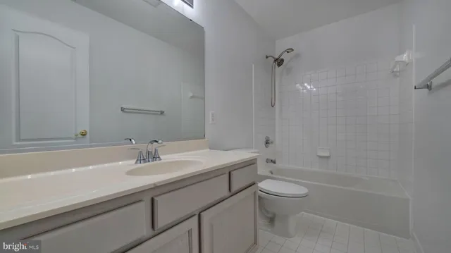 a view of storage and utility room with washer and dryer