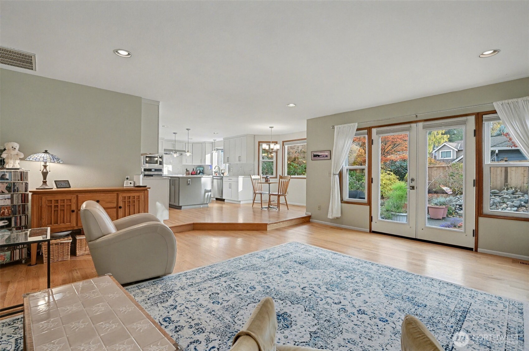 15823 Southeast 182nd Place Renton, WA 98058 - Photo 11 of 30 a living room with furniture and large windows