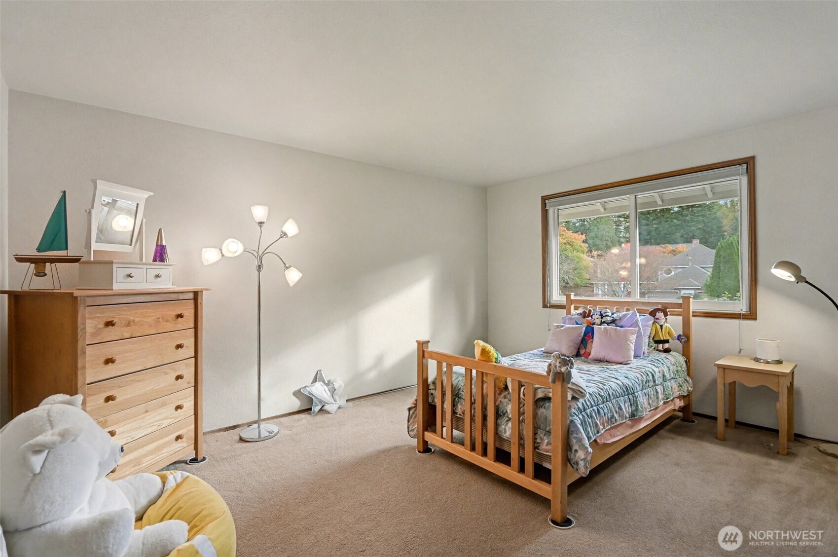 15823 Southeast 182nd Place Renton, WA 98058 - Photo 21 of 30 a bed room with a bed and a window