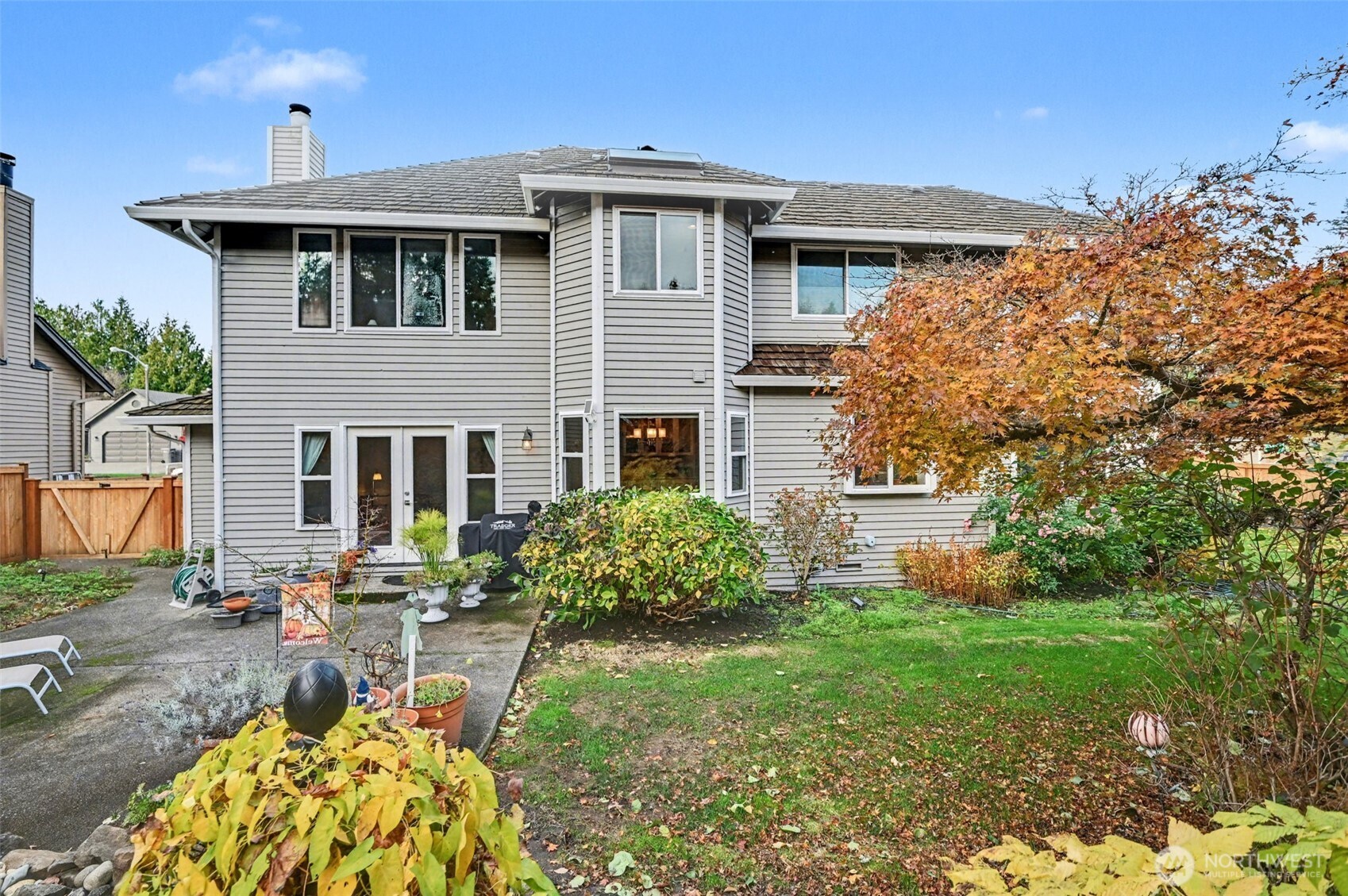 15823 Southeast 182nd Place Renton, WA 98058 - Photo 26 of 30 a front view of a house with garden