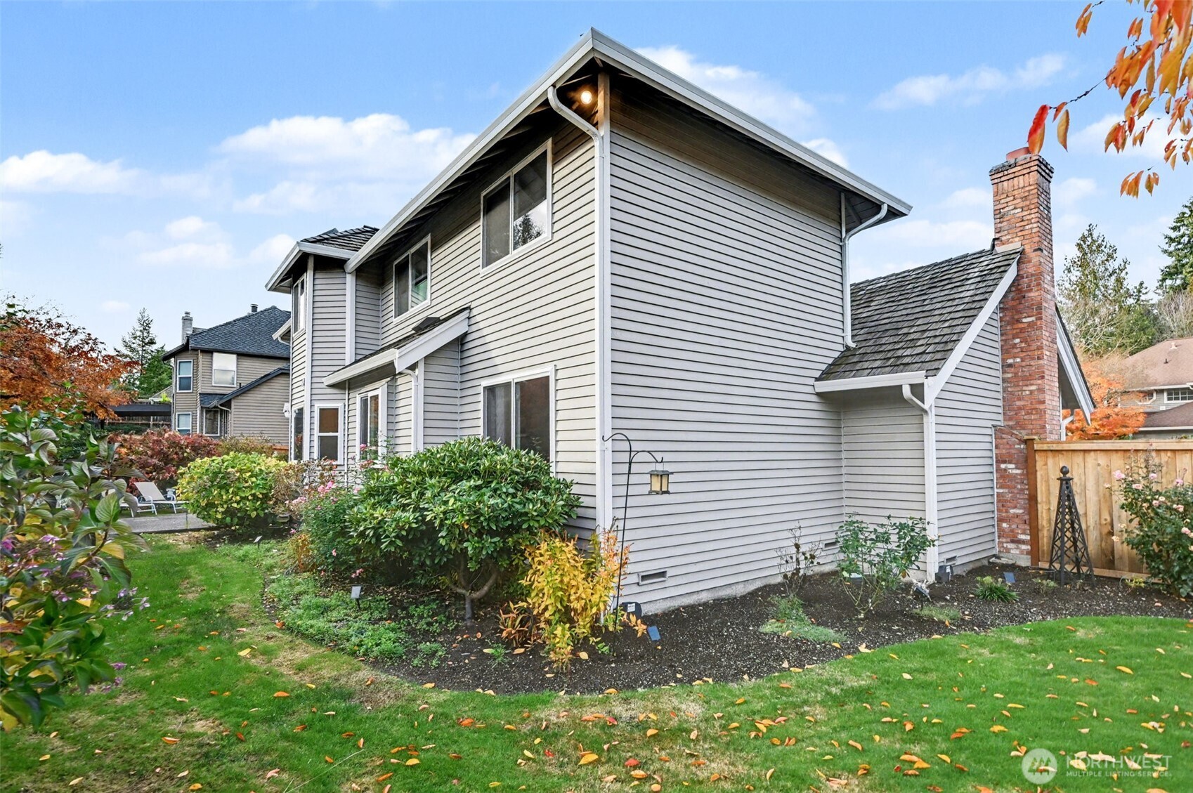 15823 Southeast 182nd Place Renton, WA 98058 - Photo 27 of 30 a view of a house with a yard and plants