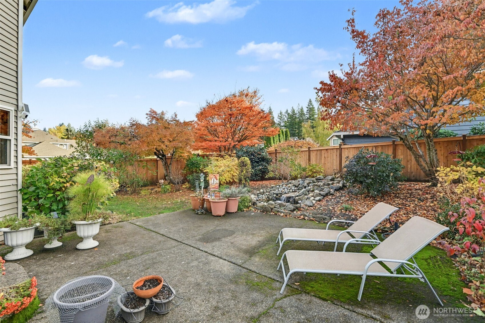 15823 Southeast 182nd Place Renton, WA 98058 - Photo 29 of 30 a view of a chairs and tables in the patio