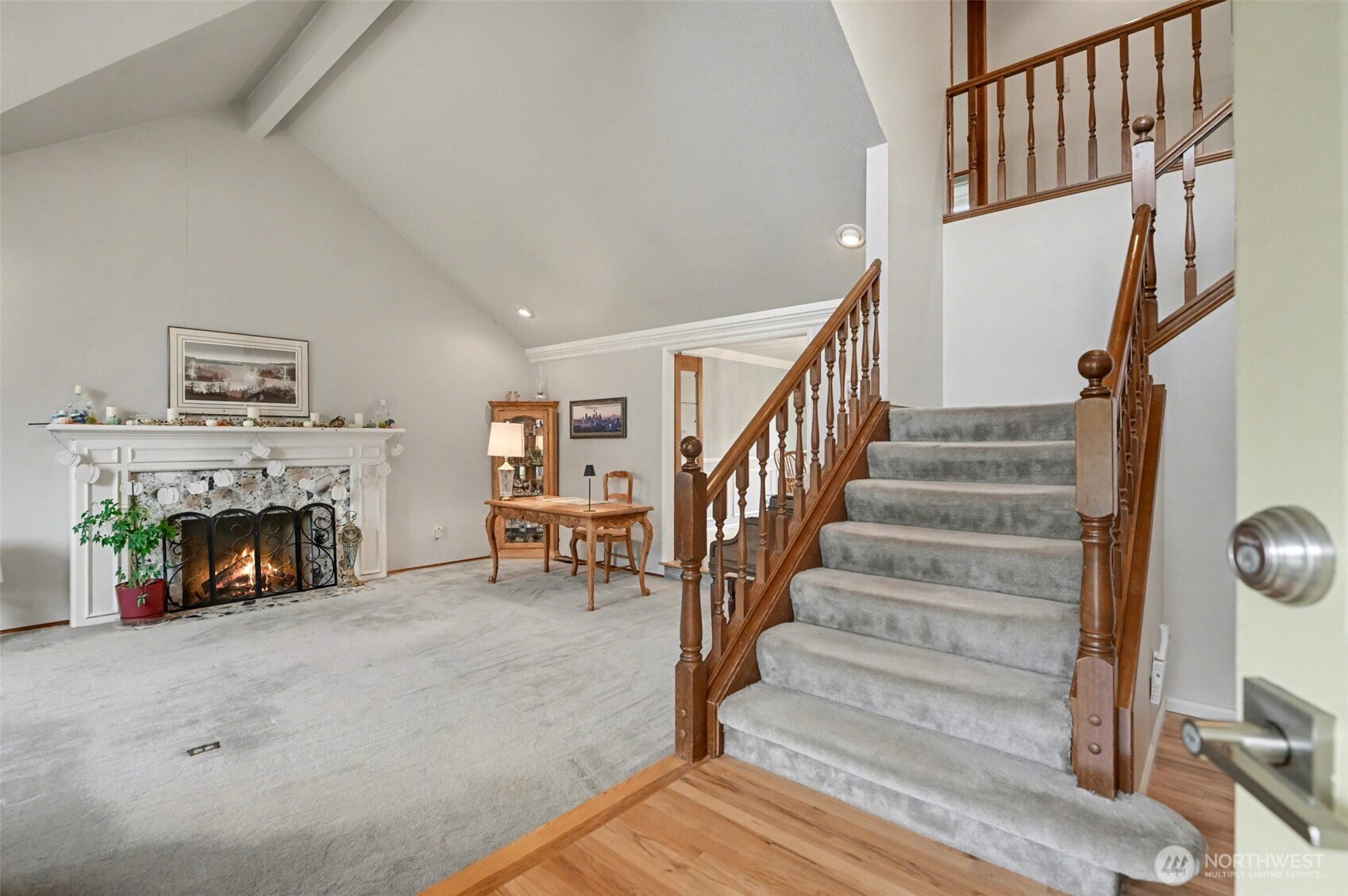 15823 Southeast 182nd Place Renton, WA 98058 - Photo 5 of 30 a view of entryway and hall with wooden floor