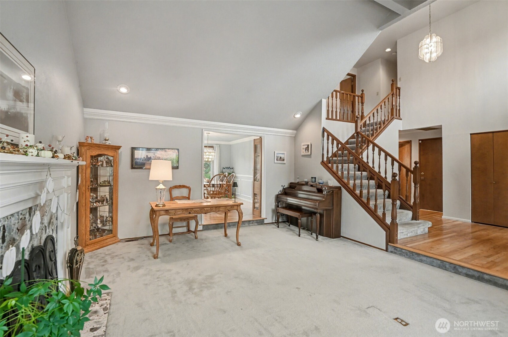 15823 Southeast 182nd Place Renton, WA 98058 - Photo 6 of 30 a living room with furniture and a fireplace
