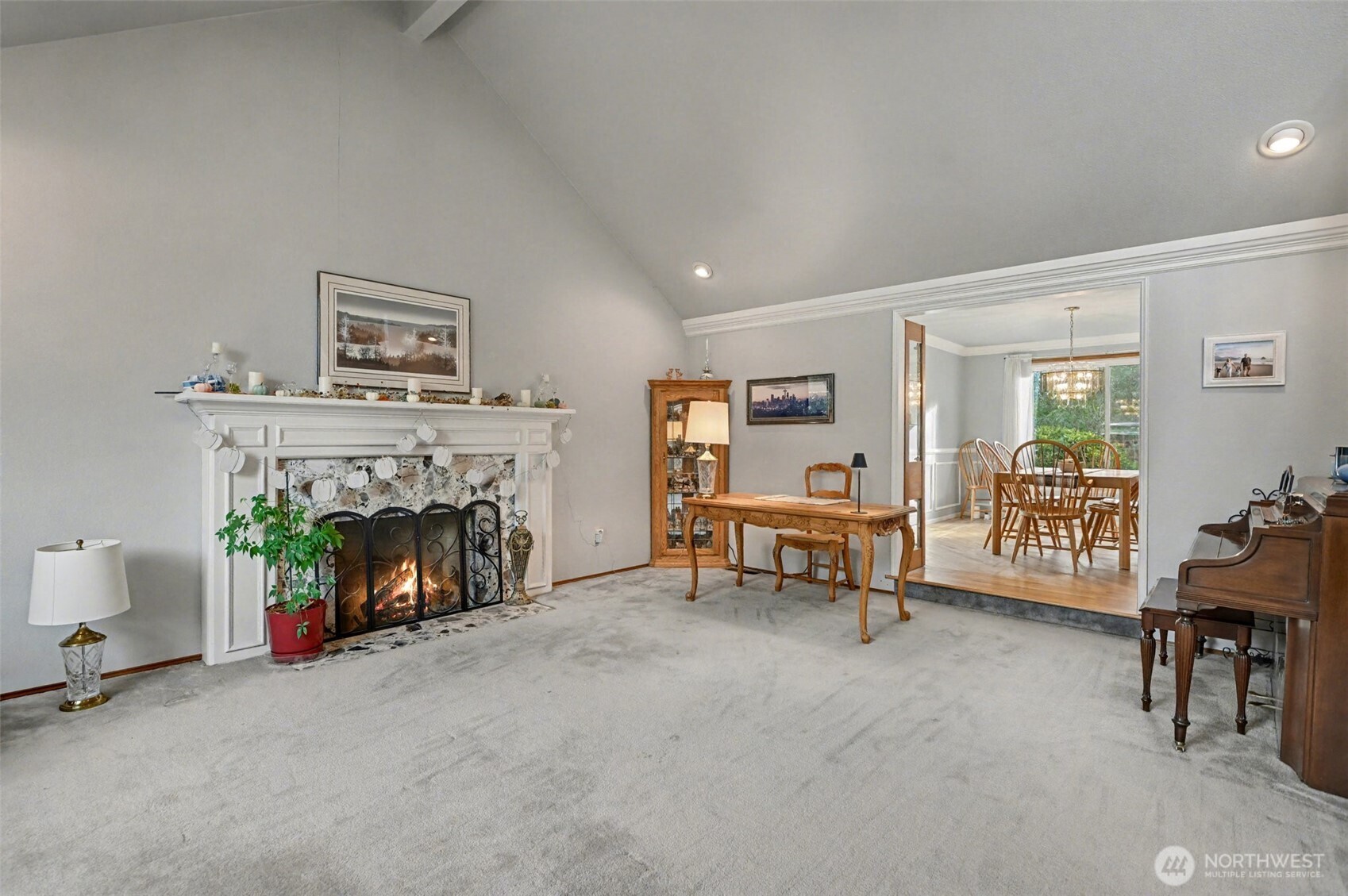 15823 Southeast 182nd Place Renton, WA 98058 - Photo 8 of 30 a living room with furniture and a fireplace