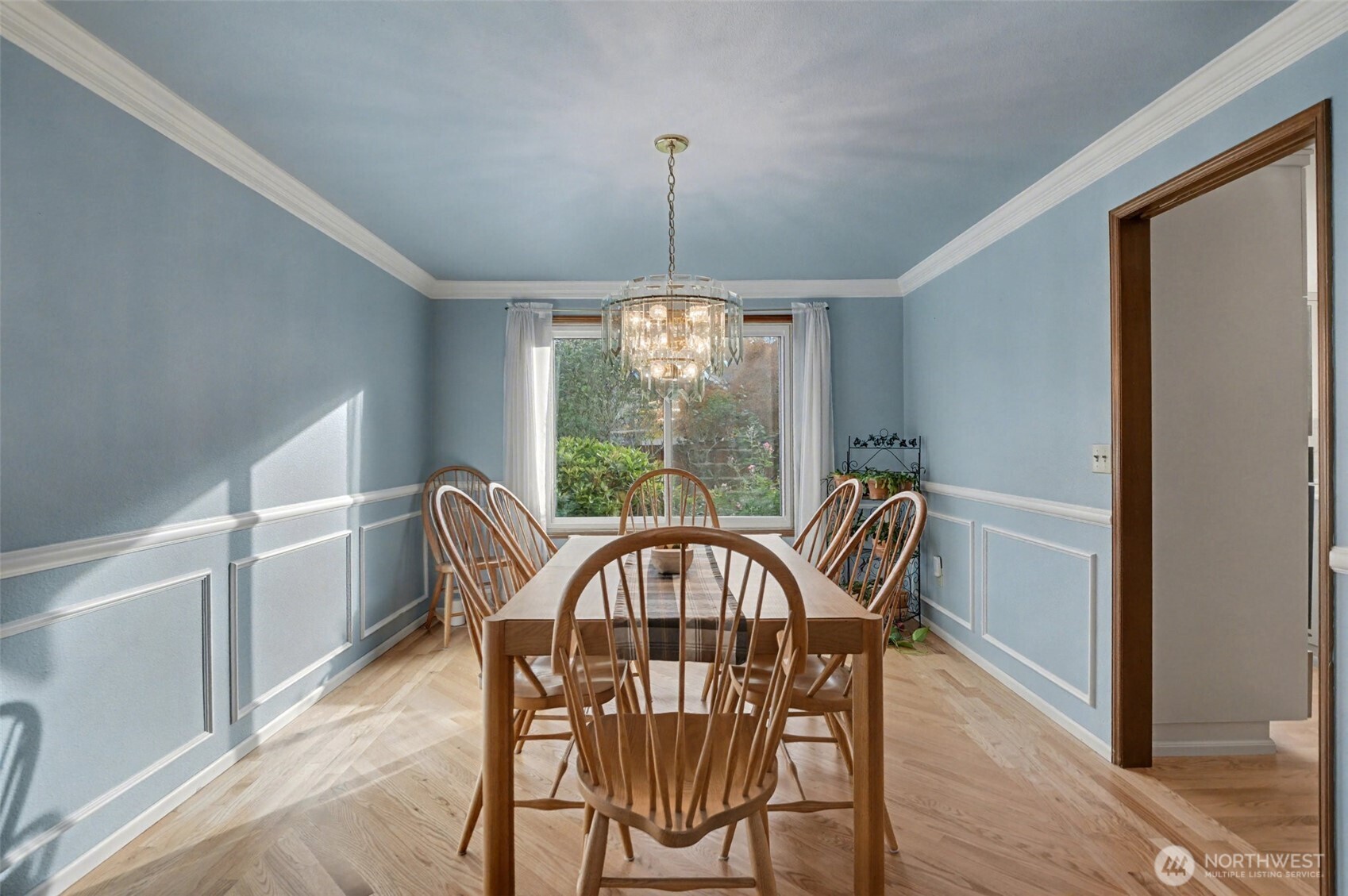 15823 Southeast 182nd Place Renton, WA 98058 - Photo 9 of 30 a view of a dining room with furniture window and wooden floor