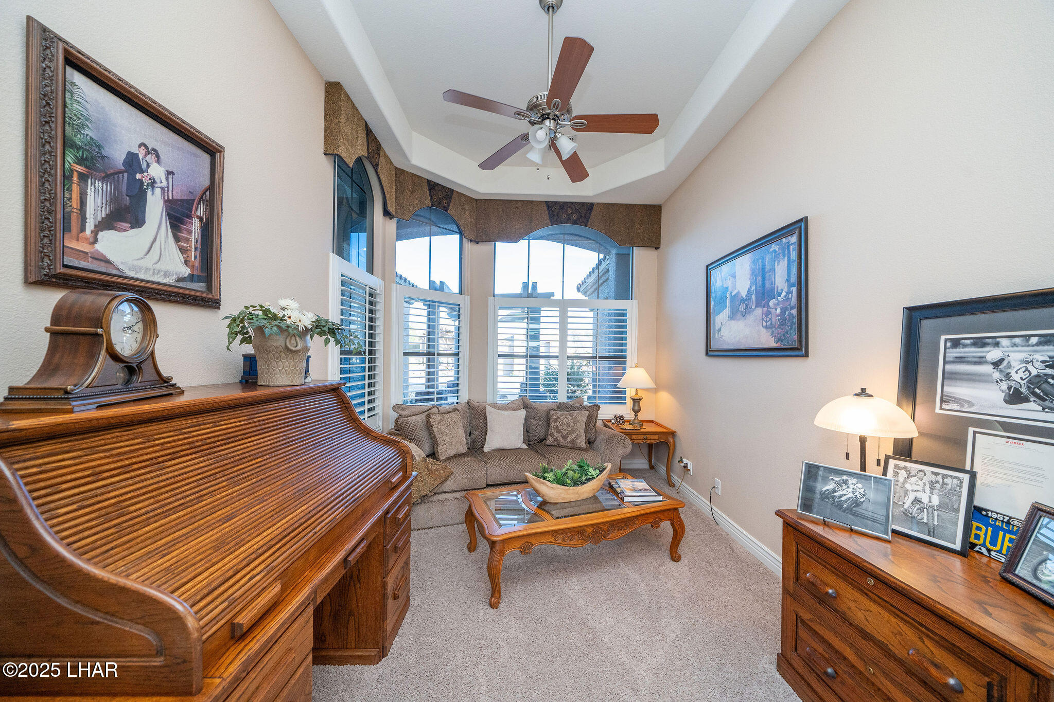 3553 North Swilican Bridge Road Lake Havasu City, AZ 86404 - Photo 20 of 104 a bedroom with furniture and a large window