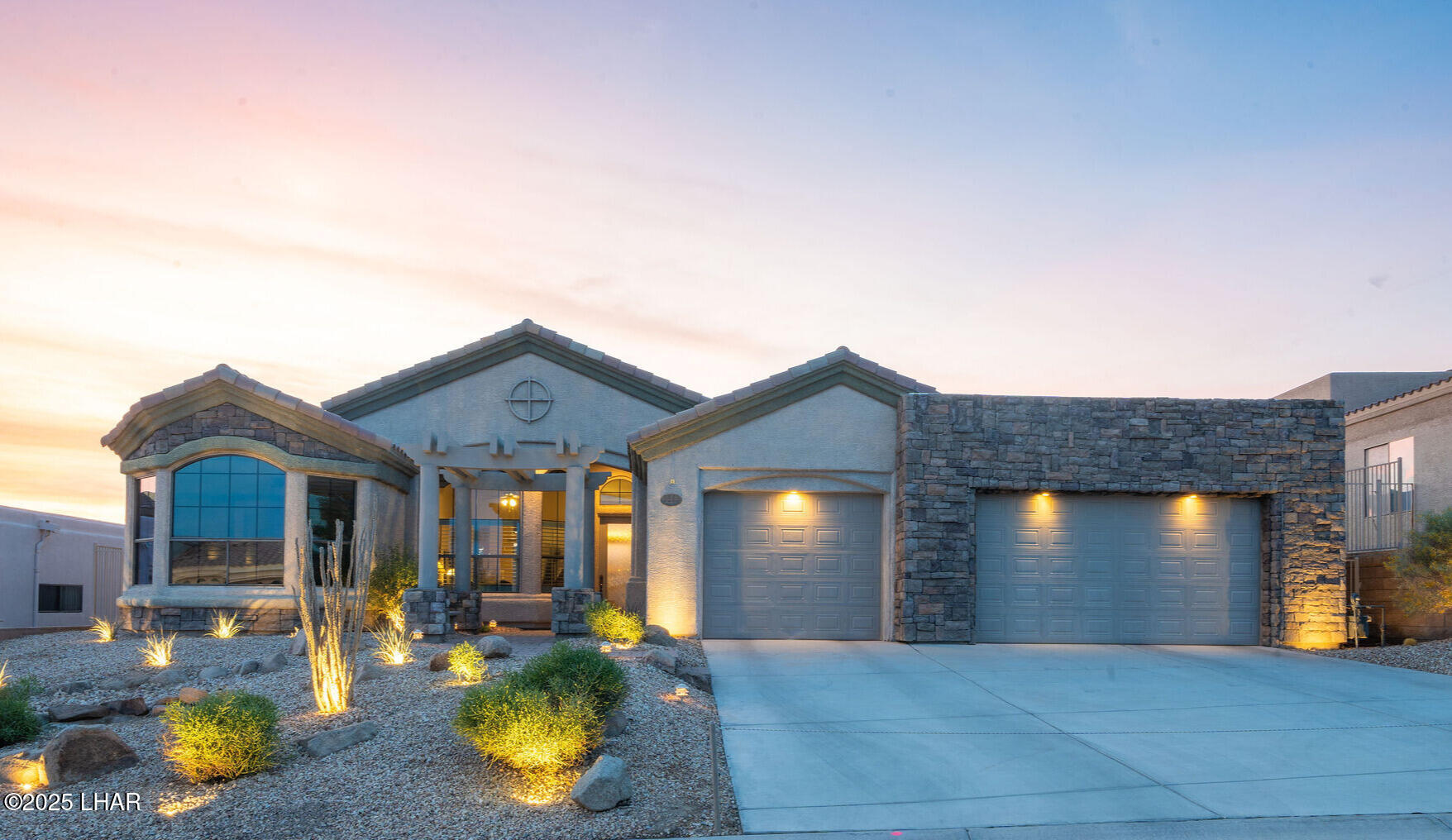 3553 North Swilican Bridge Road Lake Havasu City, AZ 86404 - Photo 2 of 104 a front view of a house with swimming pool and furniture