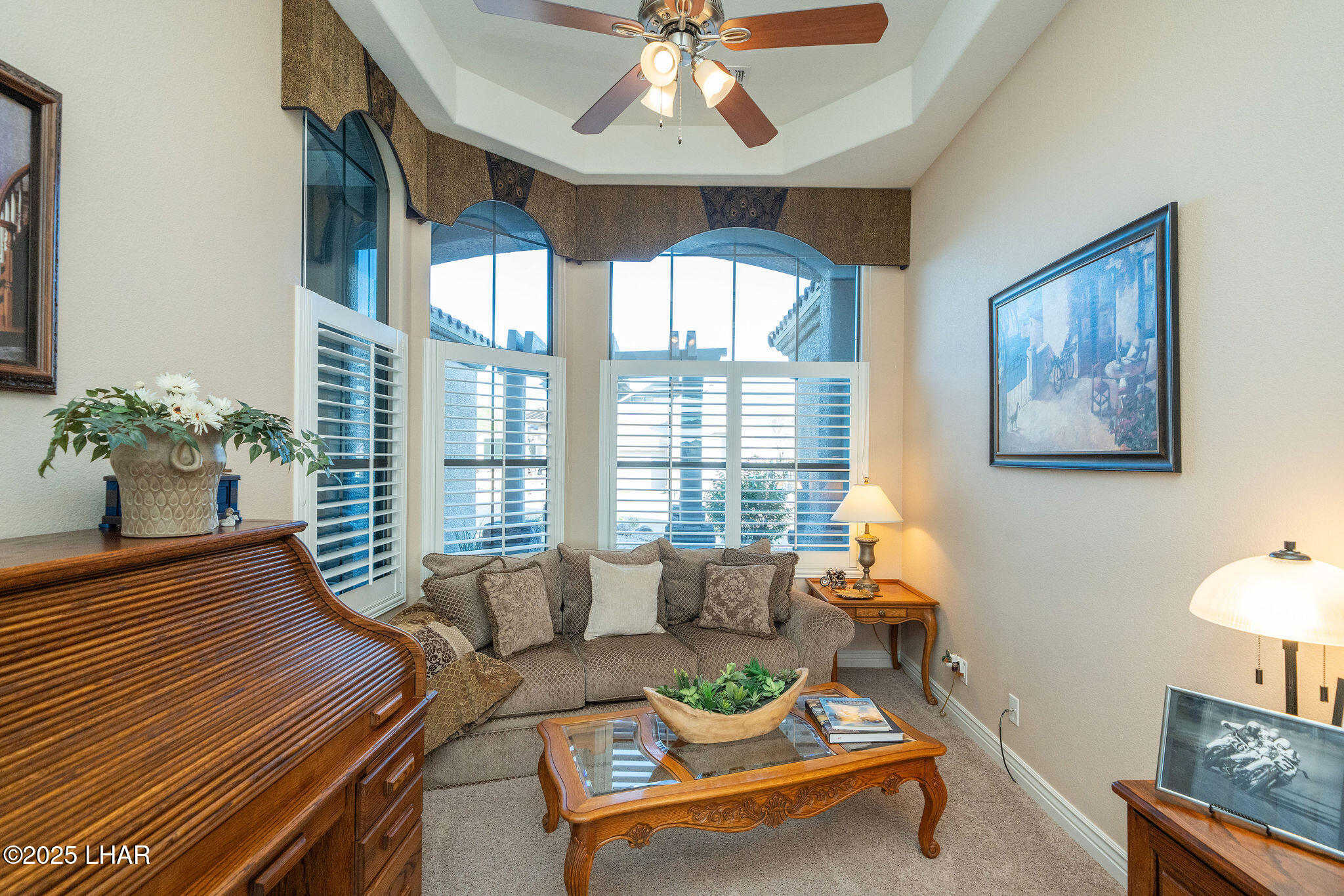 3553 North Swilican Bridge Road Lake Havasu City, AZ 86404 - Photo 24 of 104 a living room with furniture and a large window