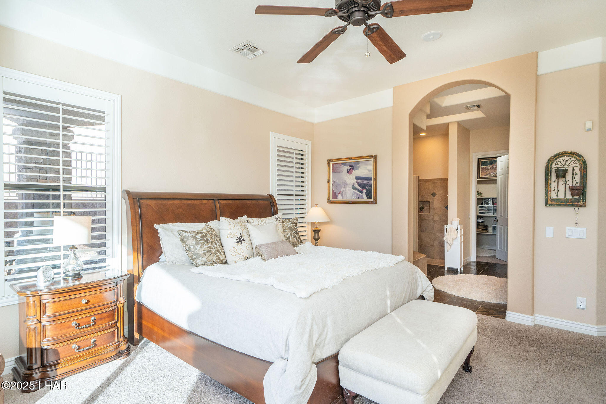 3553 North Swilican Bridge Road Lake Havasu City, AZ 86404 - Photo 26 of 104 a bedroom with a bed and wooden floor