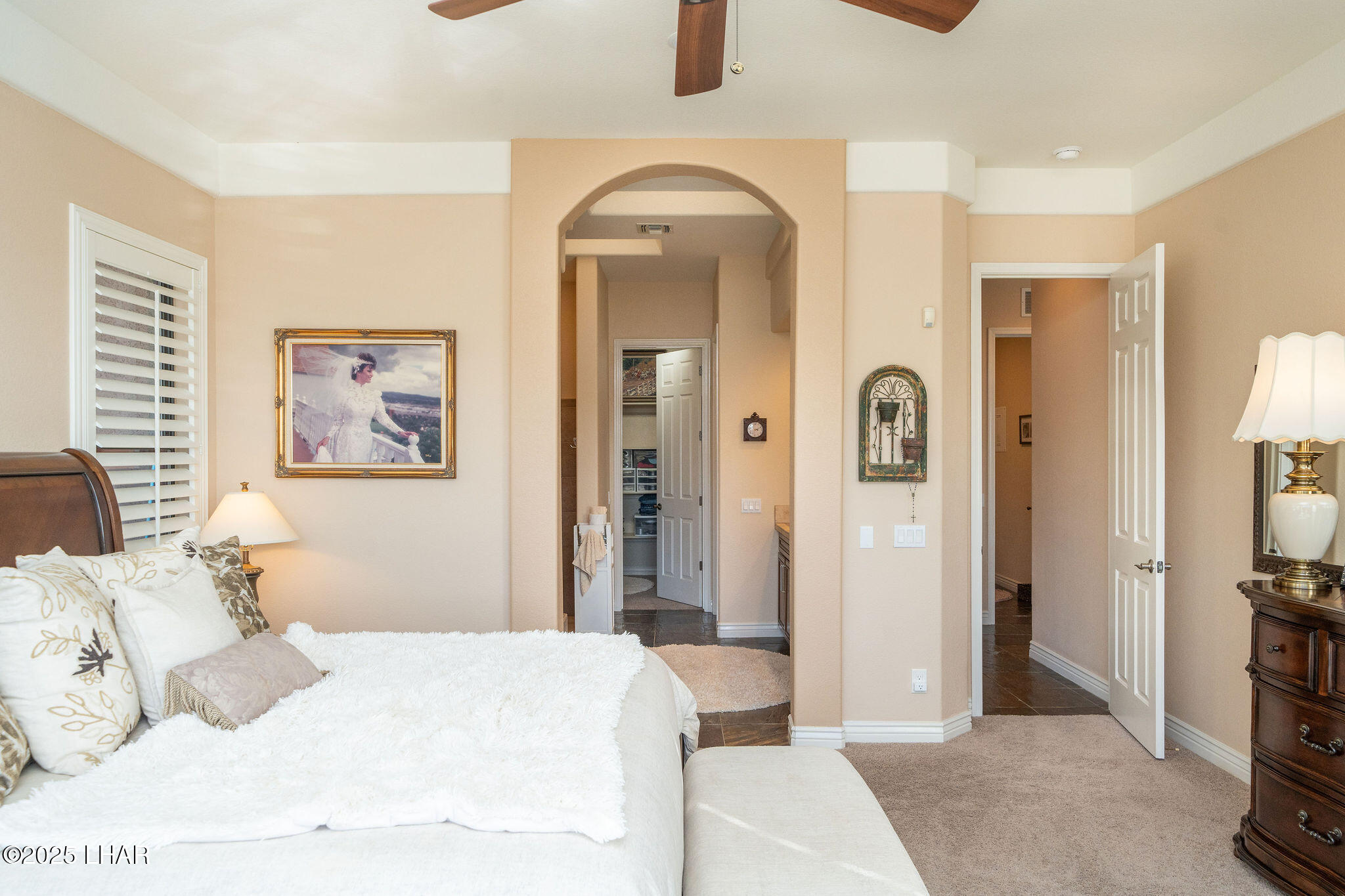 3553 North Swilican Bridge Road Lake Havasu City, AZ 86404 - Photo 27 of 104 a bedroom with a bed and a television