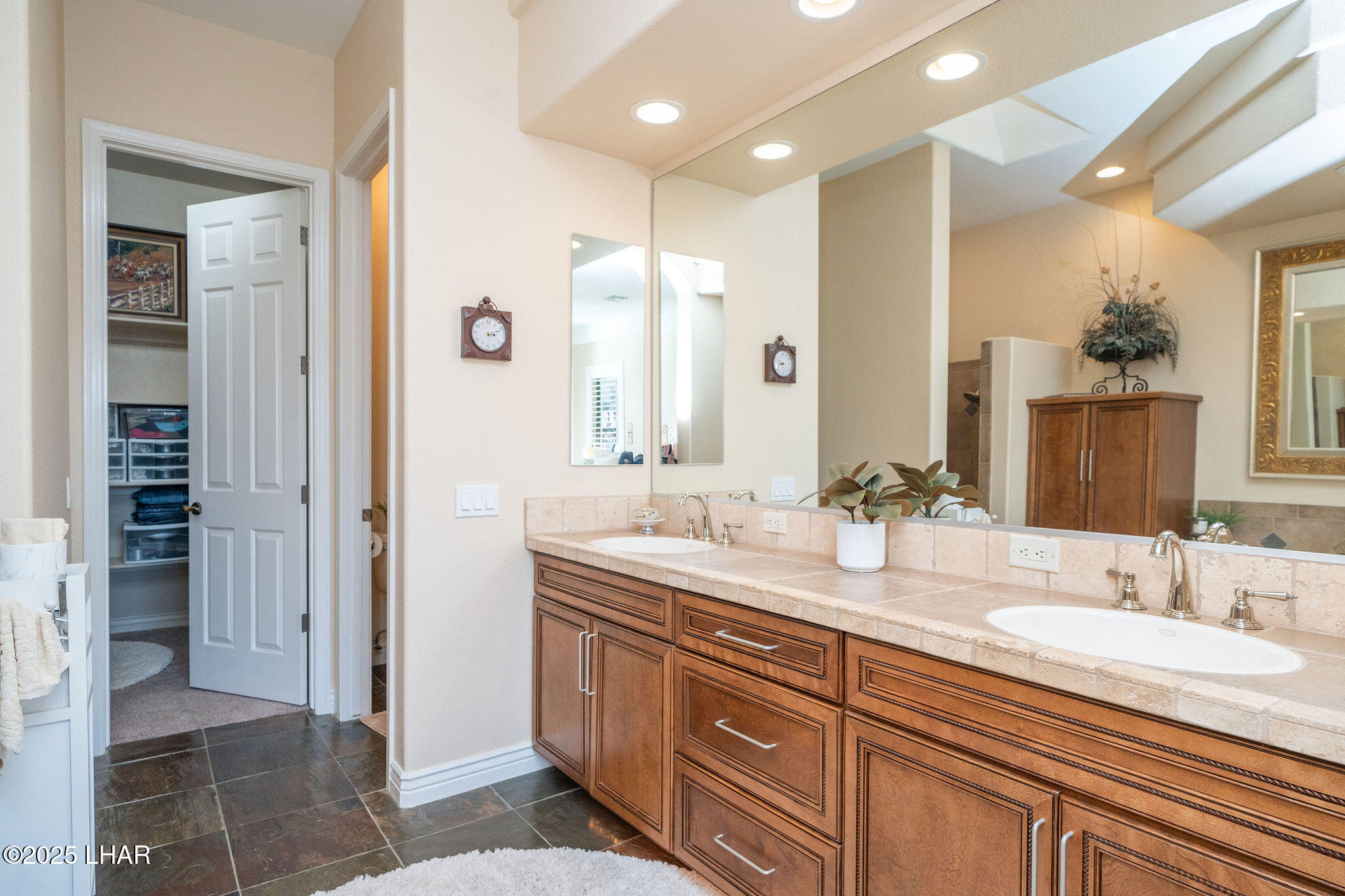 3553 North Swilican Bridge Road Lake Havasu City, AZ 86404 - Photo 33 of 104 a bathroom with a granite countertop sink and a mirror