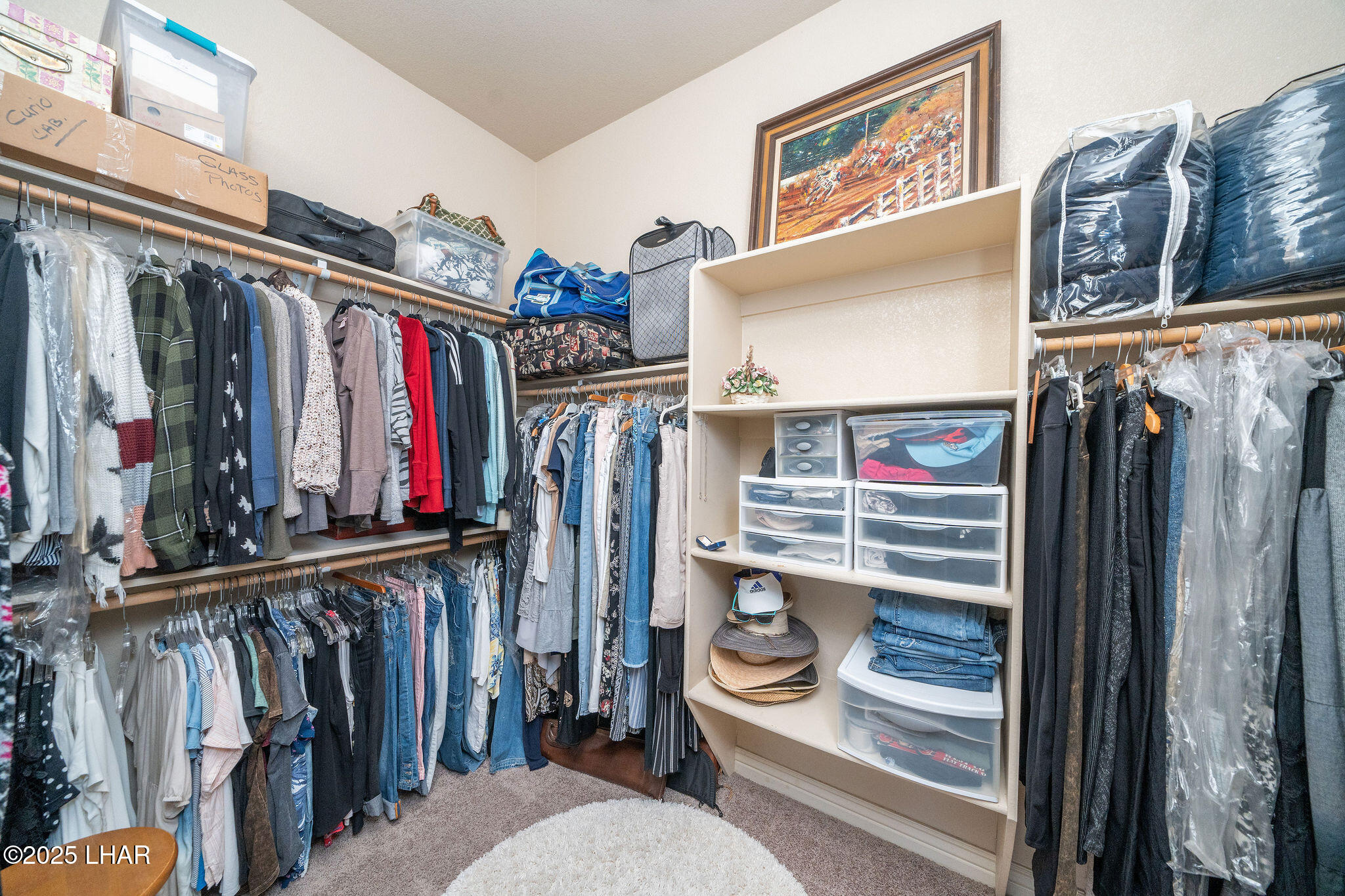3553 North Swilican Bridge Road Lake Havasu City, AZ 86404 - Photo 34 of 104 a view of walk in closet with clothes and shoes