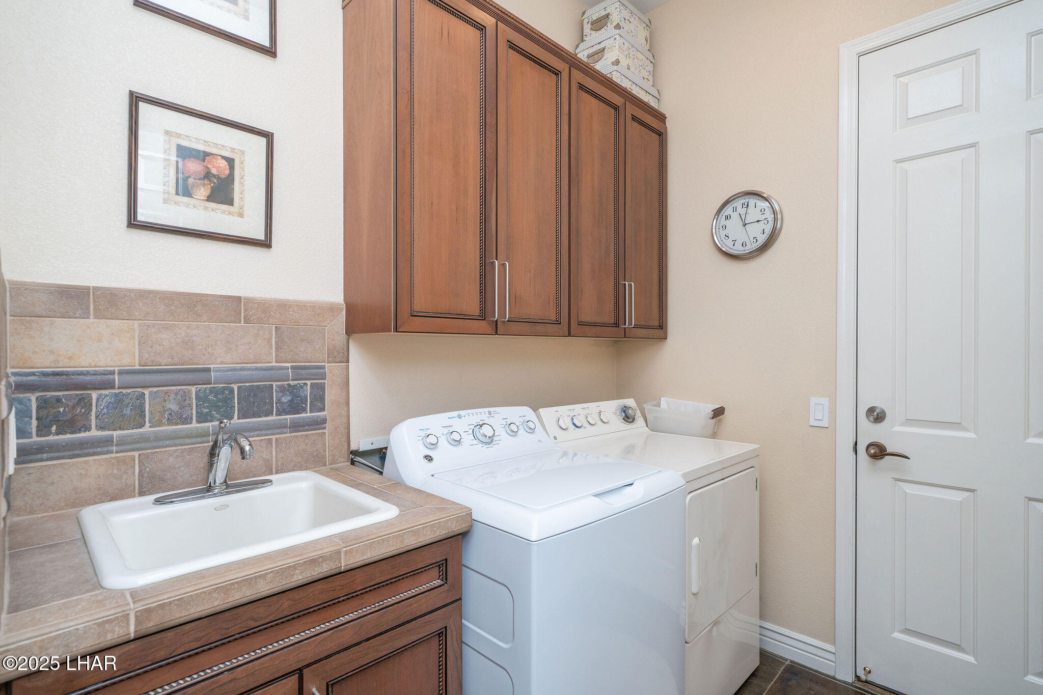 3553 North Swilican Bridge Road Lake Havasu City, AZ 86404 - Photo 42 of 104 a bathroom with a sink and a window