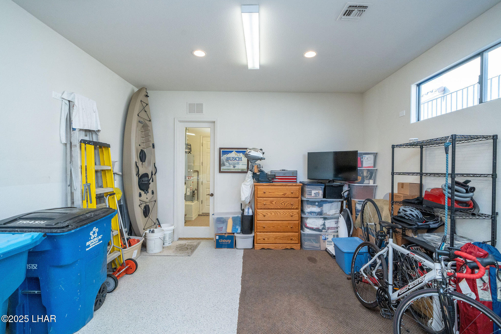 3553 North Swilican Bridge Road Lake Havasu City, AZ 86404 - Photo 48 of 104 a children room with furniture and a flat screen tv