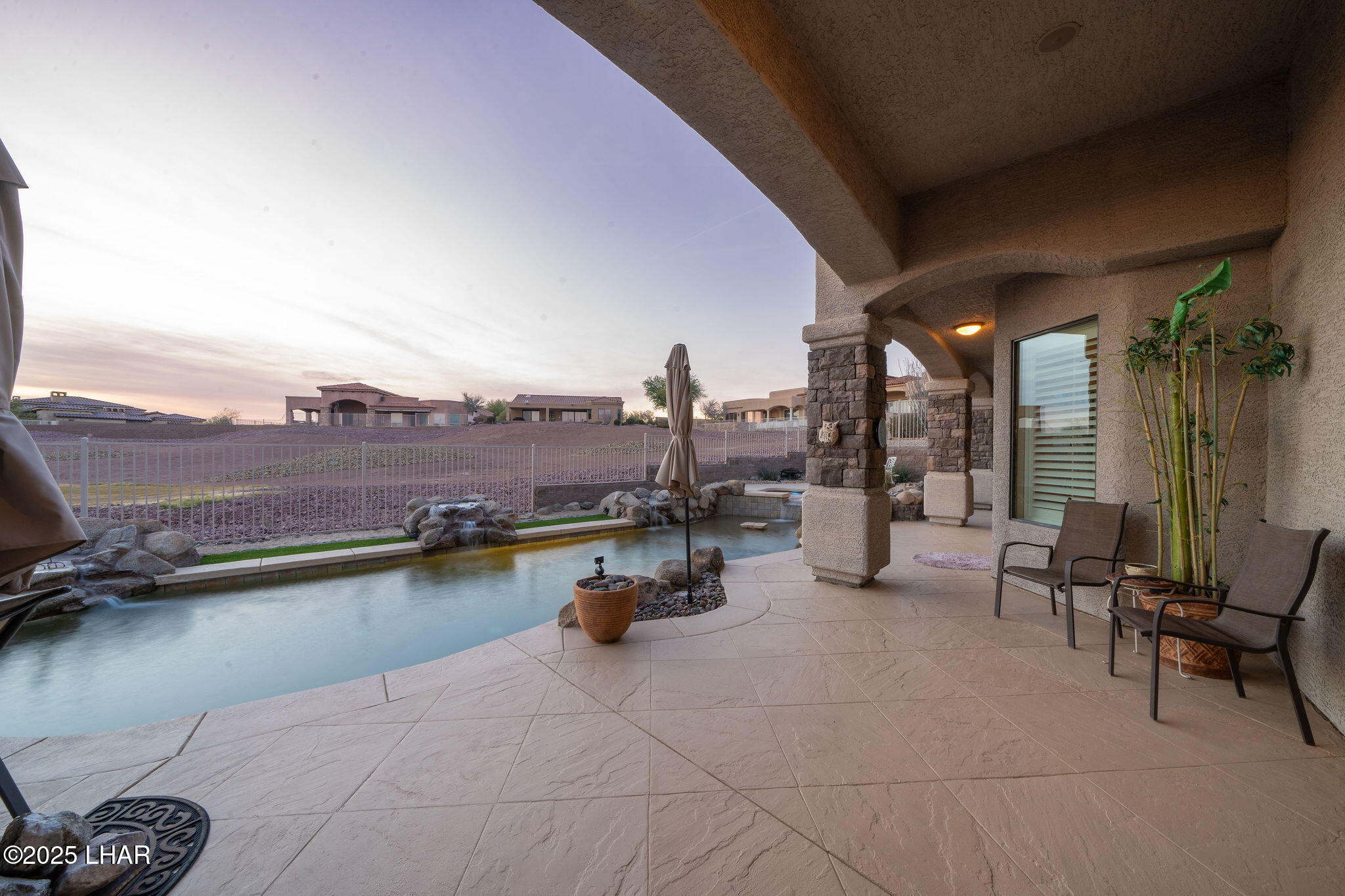 3553 North Swilican Bridge Road Lake Havasu City, AZ 86404 - Photo 53 of 104 a view of a swimming pool and lounge chair