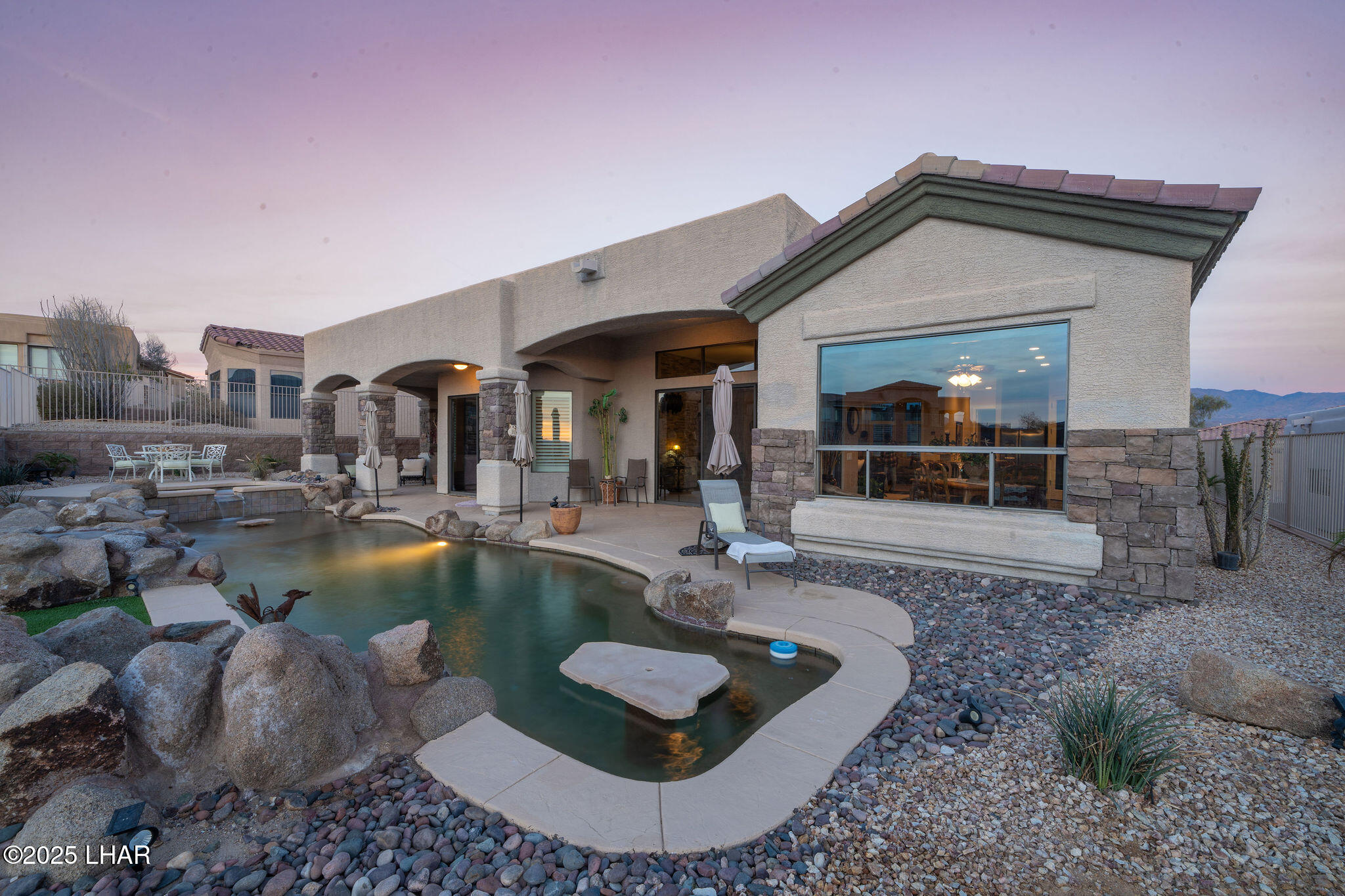 3553 North Swilican Bridge Road Lake Havasu City, AZ 86404 - Photo 54 of 104 a view of a house with swimming pool and sitting area