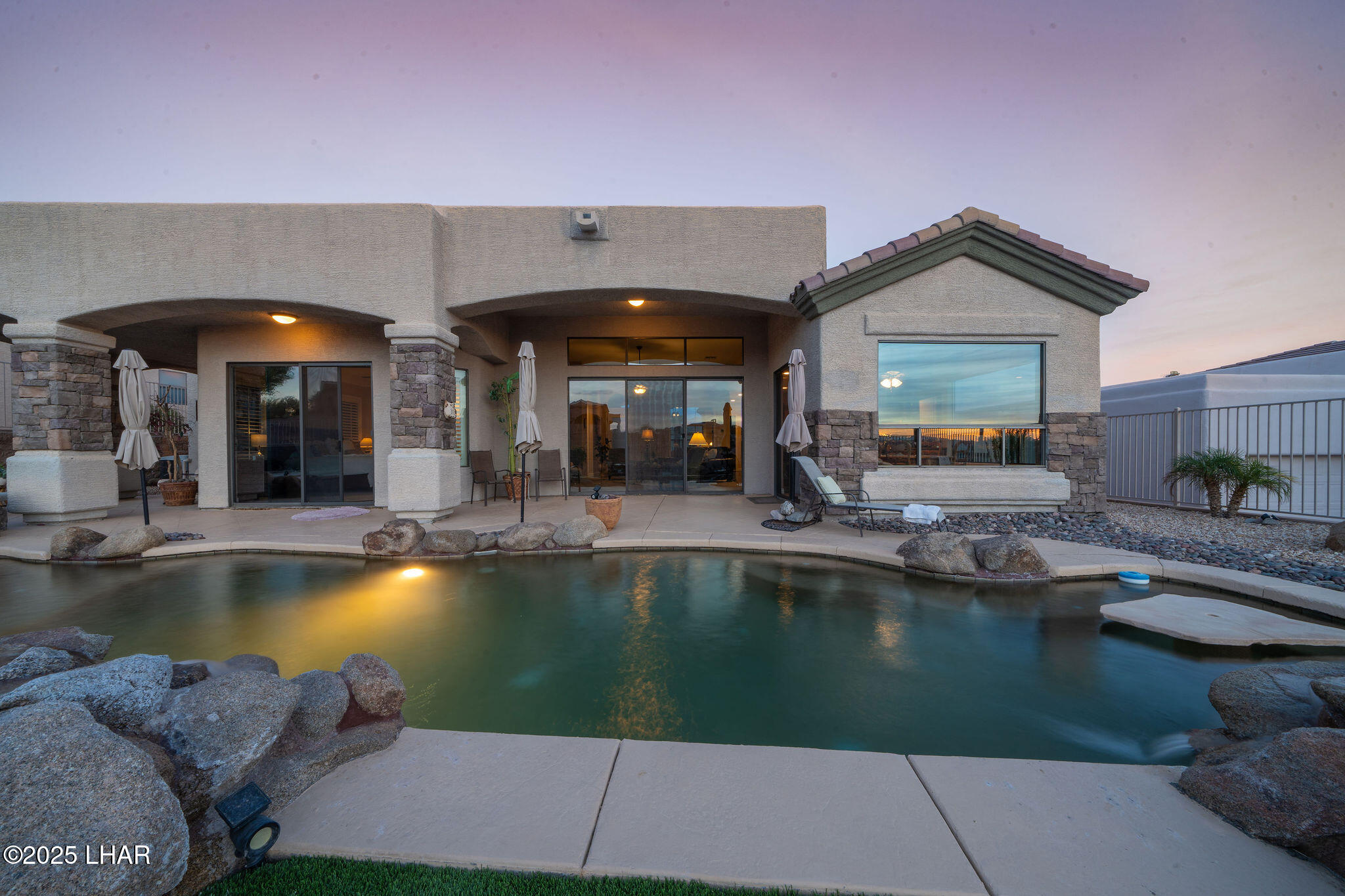 3553 North Swilican Bridge Road Lake Havasu City, AZ 86404 - Photo 57 of 104 a view of a swimming pool with outdoor seating