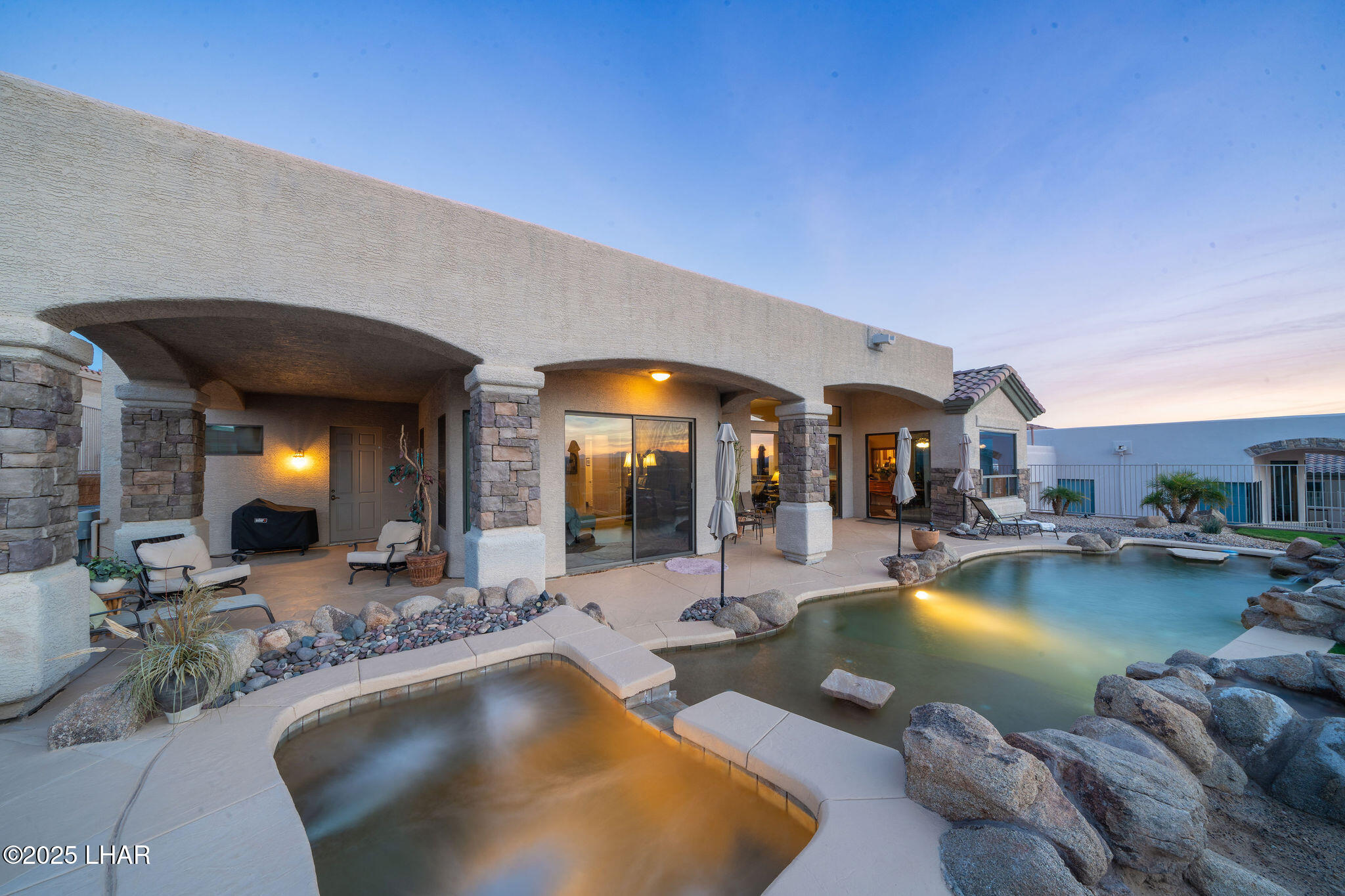 3553 North Swilican Bridge Road Lake Havasu City, AZ 86404 - Photo 63 of 104 a view of a swimming pool with outdoor seating
