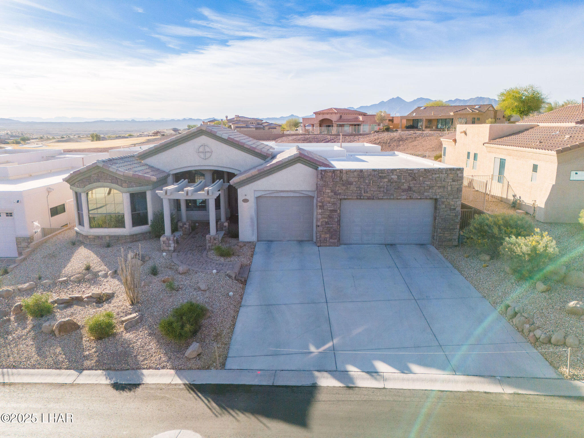 3553 North Swilican Bridge Road Lake Havasu City, AZ 86404 - Photo 88 of 104 a view of a terrace with lawn chairs
