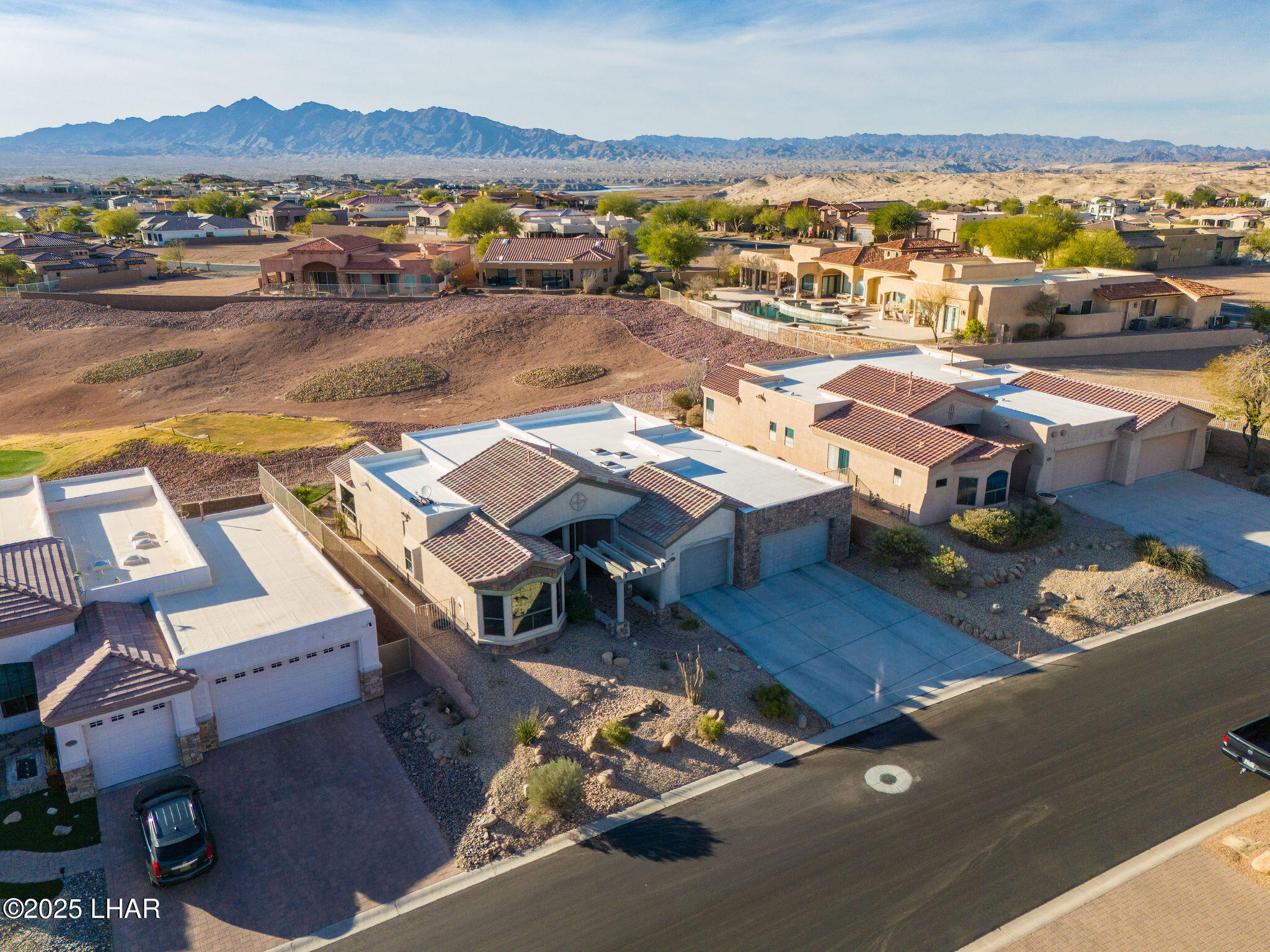3553 North Swilican Bridge Road Lake Havasu City, AZ 86404 - Photo 93 of 104 an aerial view of residential houses with outdoor space
