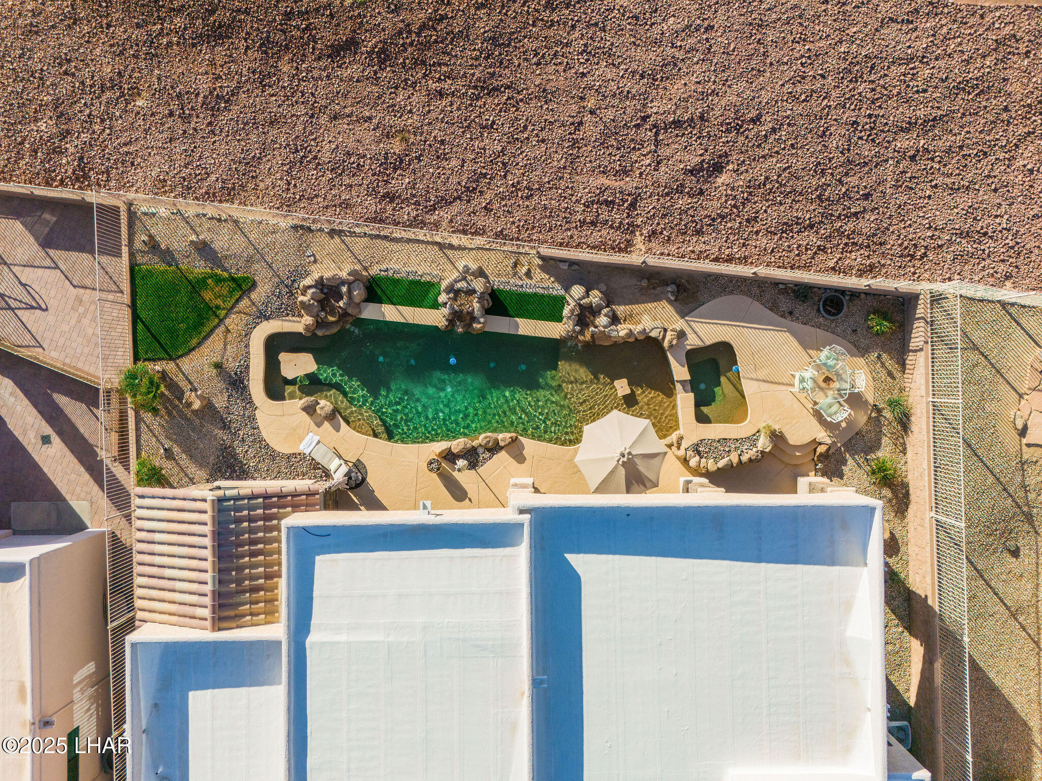 3553 North Swilican Bridge Road Lake Havasu City, AZ 86404 - Photo 95 of 104 an aerial view of a house with a yard