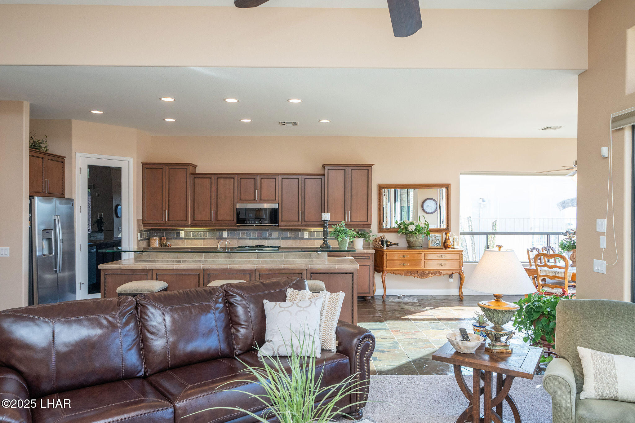 3553 North Swilican Bridge Road Lake Havasu City, AZ 86404 - Photo 10 of 104 a living room with stainless steel appliances kitchen island granite countertop furniture and a large window