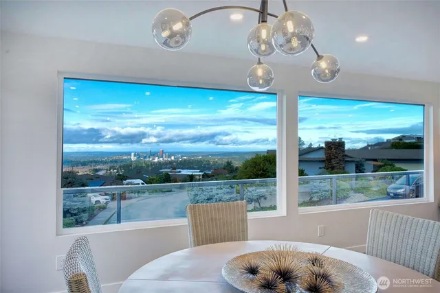 a view of a floor to ceiling window and a table