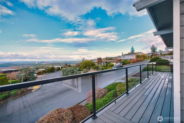 a view of balcony with furniture