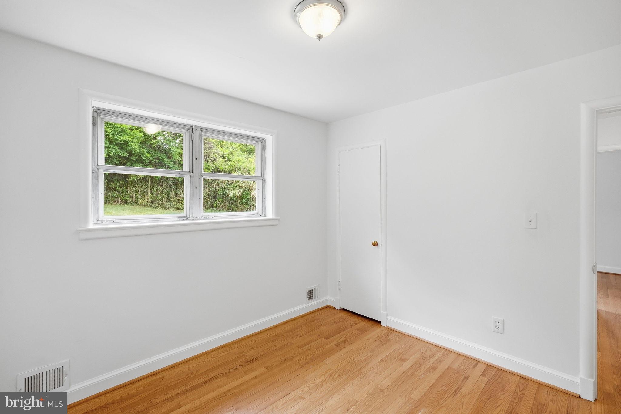 10207 Brunswick Avenue Silver Spring, MD 20902 - Photo 18 of 34 Third Bedroom