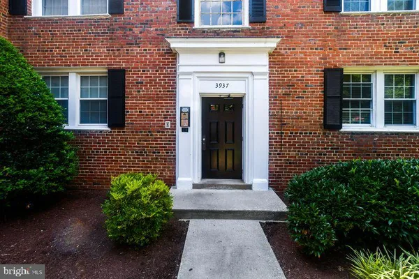 a view of entrance of the house and front of a house
