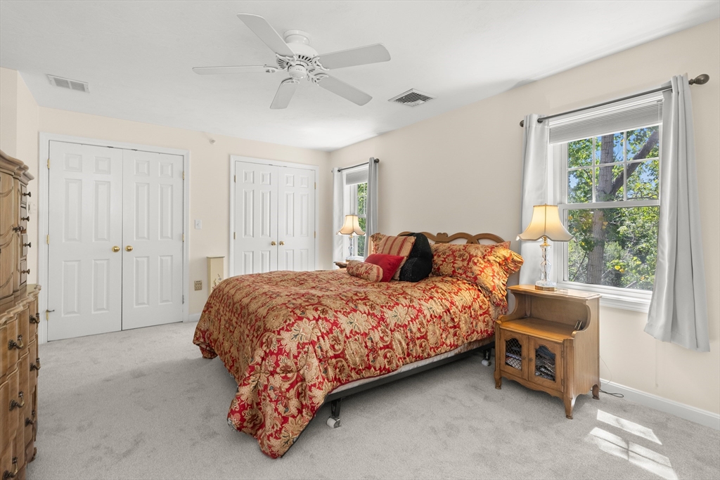 35 Collins Street, Unit 87 Danvers, MA 01923 - Photo 12 of 28 a bedroom with a bed and a window