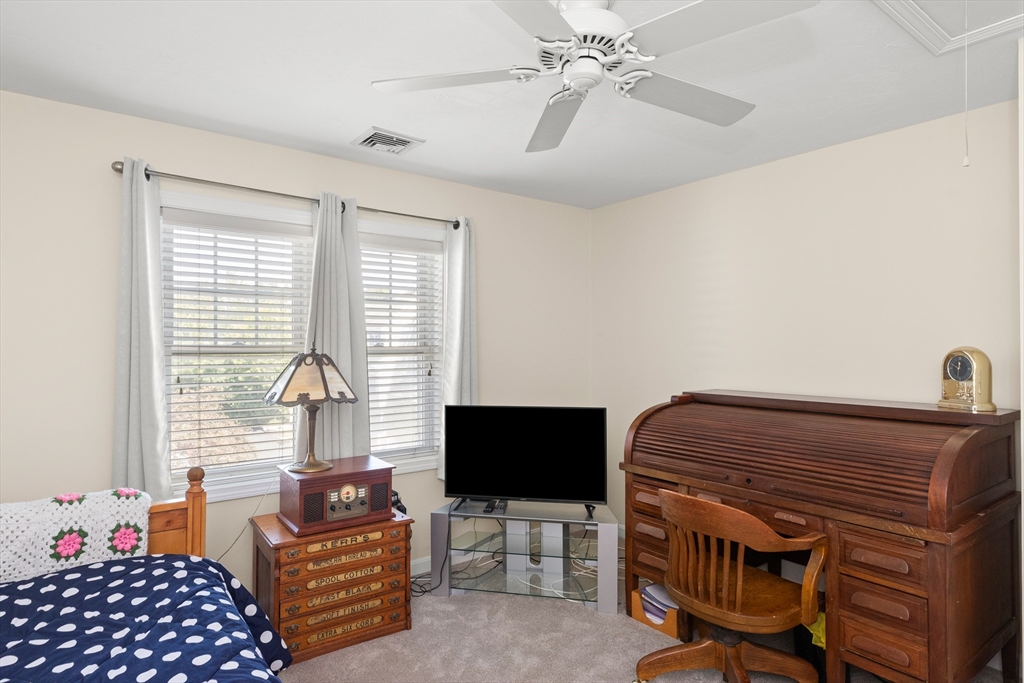 35 Collins Street, Unit 87 Danvers, MA 01923 - Photo 17 of 28 a view of a livingroom with workspace and a window