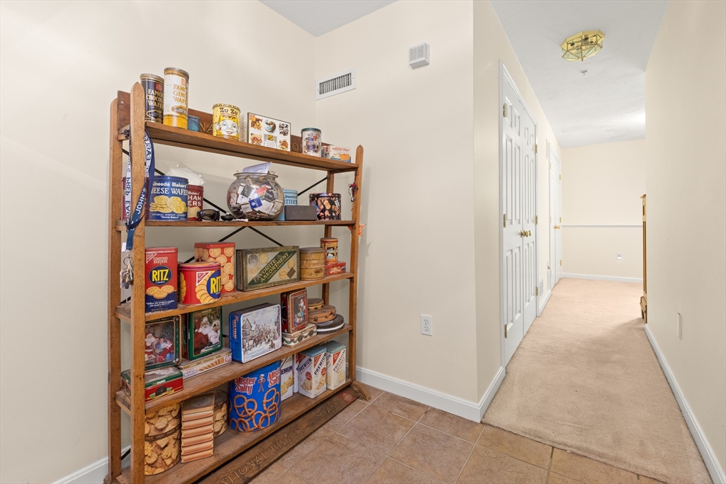 35 Collins Street, Unit 87 Danvers, MA 01923 - Photo 21 of 28 a view of a hallway with seating area